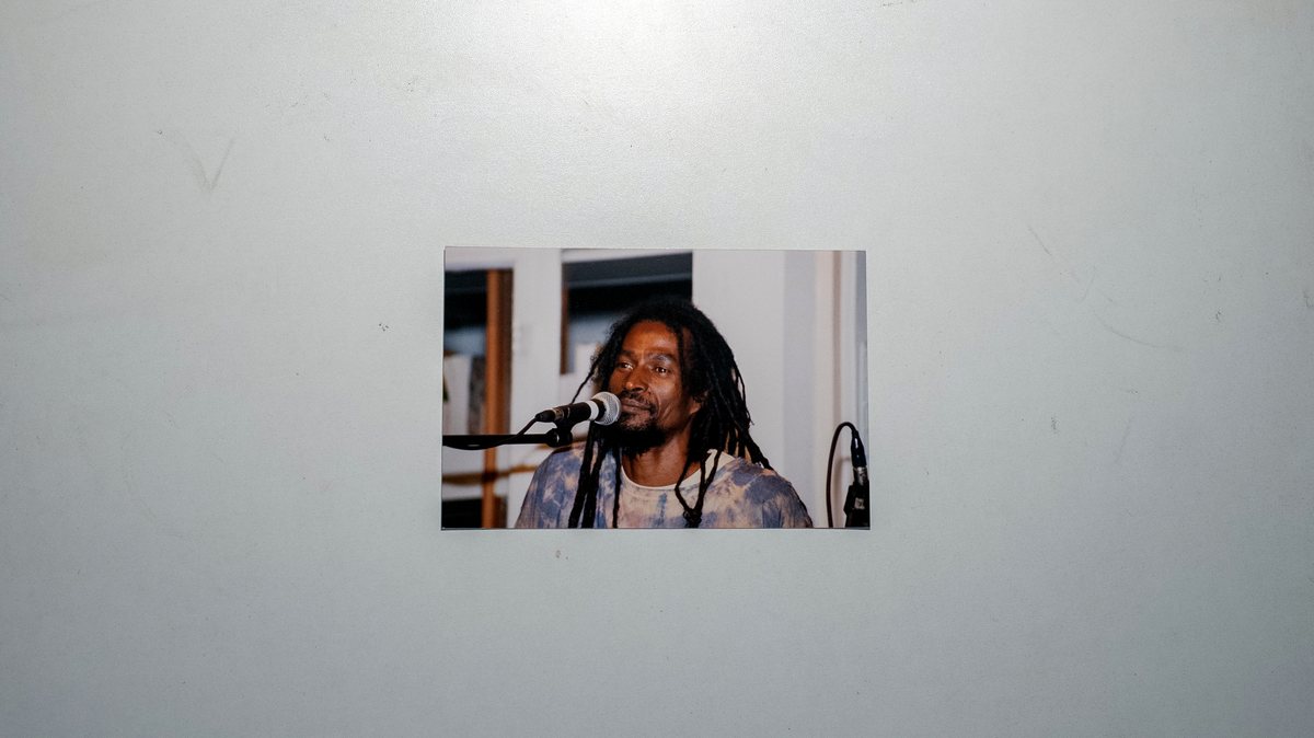 menwar at the mic, 1990s